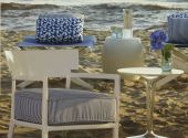 cara-outdoor-poltrona-kartell-di-design-in-avorio-rivestimento-stripes-blu